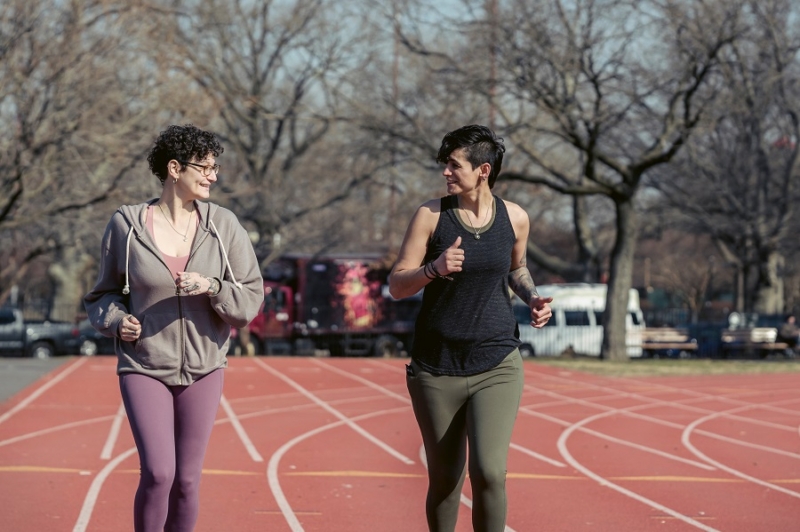 Donne Che Corrono Su Pista